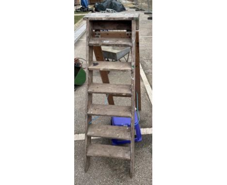 A wooden Step Ladder