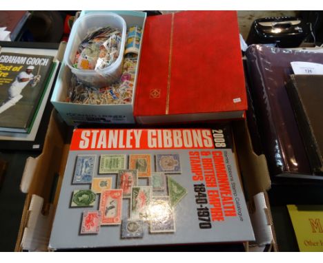 A box containing five albums of world stamps, to include Commonwealth examples, together with others loose, an 1840 - 1970 St