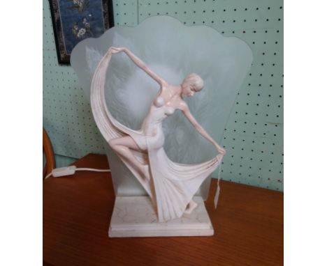 An Art Deco-style table lamp, depicting female dancer with out swept skirt before a frosted glass shade (39cm).