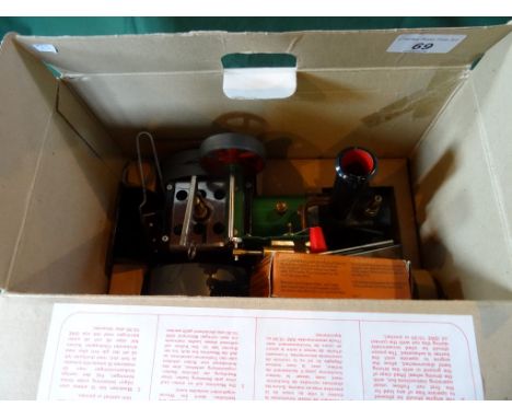 A Mamod Steam Roller, with accessories and original box, appears in unused condition.