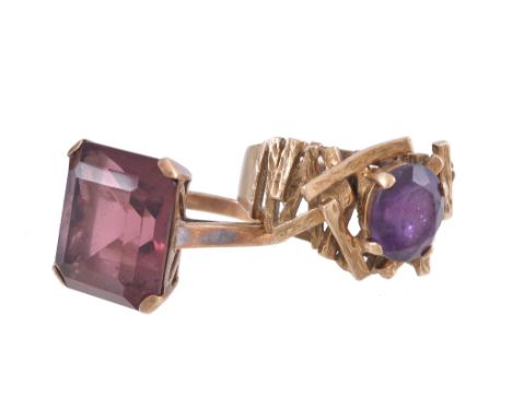  A 9 carat gold amethyst ring,   the oval cut amethyst claw set on a textured openwork setting, stamped 375 with London hallm