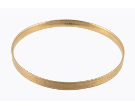  A 9 carat gold bangle,   hallmarked Birmingham 1929, 7.6cm diameter,  20.5g 
