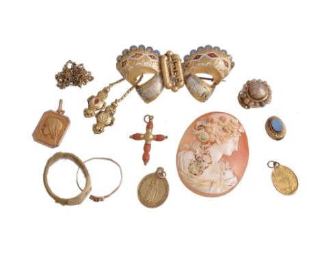 Ω A collection of antique jewellery , to include a mid 19th century gold enamelled bow brooch, 5.6cm long; a French mid 19th 