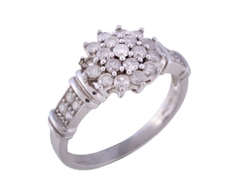  A diamond ring,   set with a cluster of brilliant cut diamonds, between brilliant cut diamond set shoulders, stamped 375, fi