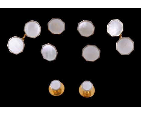 Ω A pair of 9 carat gold mother of pearl double sided cufflinks, the octagonal panels with belcher link fittings, stamped 9ct