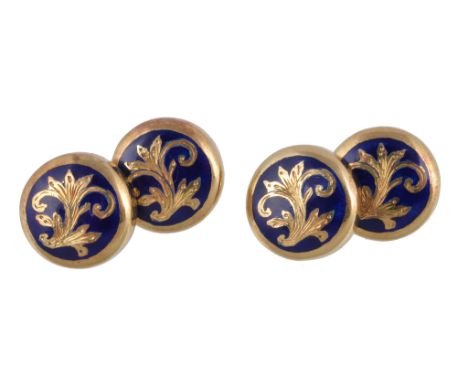  A pair of enamel double sided cufflinks,   the circular panels set with  foliate detail on a blue enamel ground, stamped 750