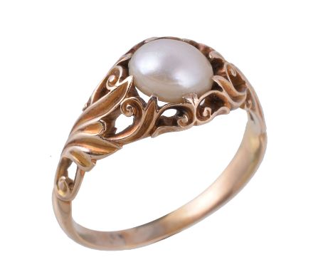  A late Victorian pearl ring,   circa 1900,    the boutton pearl in a claw setting, within a pierced scroll foliate surround,
