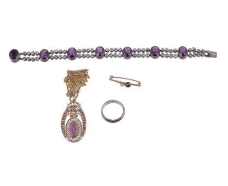  A purple and white paste bracelet,   the oval shaped purple paste with circular white paste connectors, to a concealed clasp
