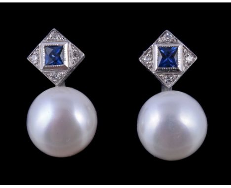  A pair of sapphire, diamond and cultured pearl earrings,   each with a squared pediments centred with a French cut sapphire,