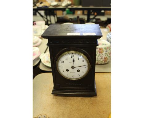 Mantel clock with enamelled dial