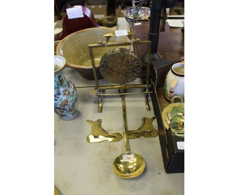 Brass dinner gong, ladle, brass boot ornaments