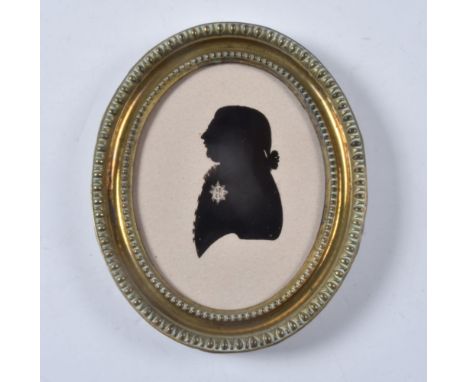 Charles Rosenberg (1745-1844)   Portrait of George III   Silhouette painted on flat glass   13cm x 9.7cm, oval   In a pressed