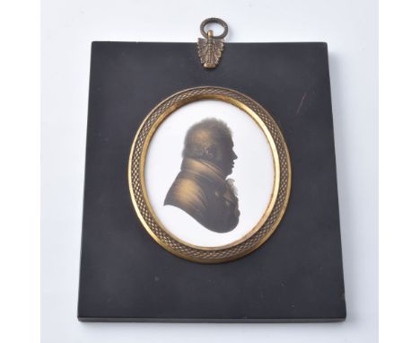 John Field (1772-1848)   Portrait of a gentleman   Silhouette on plaster with bronzing   8cm x 6cm, oval   In a rectangular p
