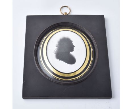 John Miers (circa 1758-1821) Portrait of a lady   Silhouette painted on plaster   8.2cm x 6.3cm, oval   In a rectangular papi
