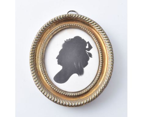 John Miers (British, circa 1758-1821) Portrait of a lady   Silhouette painted on plaster 8.3cm (3 1/4in) high, oval In presse