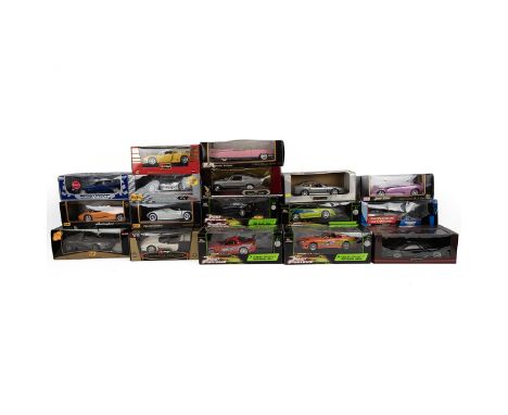 Quantity of boxed scale model die-cast cars, 1:18 scale. Includes examples by Maisto, UT models, Danjaq, Racing Champions, Bb