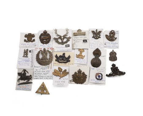 Quantity of military badges including: 26th Hussars, South Notts Hussars, Royal Wiltshire, Warwickshire Yeomanry, Queen's Own