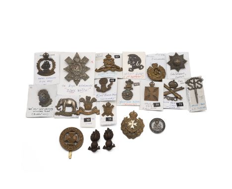 Group of military badges including: West Kent Yeomanry, Engineers, Royal Jersey Light Infantry, King's Own Malta Reg't, Royal