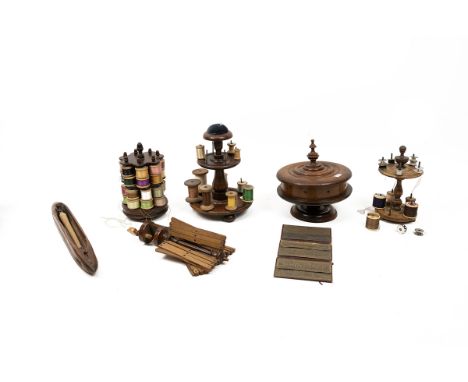 Four Victorian mahogany sewing stands of varying forms, together with a wool winder, a weaving shuttle and a vintage Henry Mi