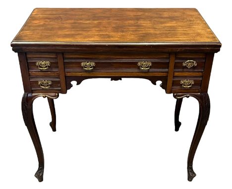 Edwardian mahogany fold-over card table, having moulded edge, two flat top with baize playing surface, over an arrangement of
