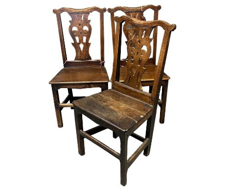 Matched set of three 18th Century Welsh oak Chippendale style farmhouse dining chairs with pierced splat backs, solid seats a