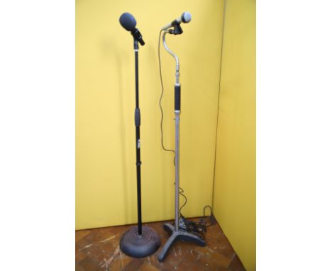 Two vintage Microphone stands. One with unamed Mic with lead, the other has a Shure Prologue Microphone with no lead. Both in