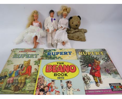 Two 1966 Barbie dolls, 1968 Ken doll, (Crystal barbie and ken) Vintage Sooty puppet and Rupert the bear and and Beno books.