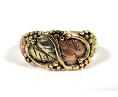 10ct Yellow Gold Ring set with an attractive twin leaf design.  Finger size 'Q'  4.5g
