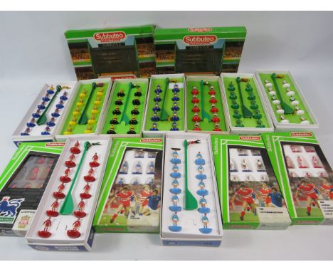 13 Subbuteo team player sets and two scoreboards.