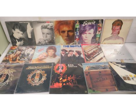 Fifteen Vintage Vinyl LP's by David Bowie, Bachman Turner Overdrive,Free.  See photos.