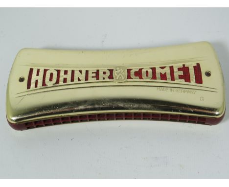 Vintage Hohner Comet Two sided Harmonica key C+G. slight dent to one aspect. Carved wooden holding block. See photos. 