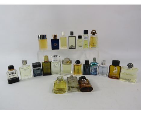 22 Mens Miniatures fragrances including Armarni, Versace, Chanel, Tiffany for men etc.