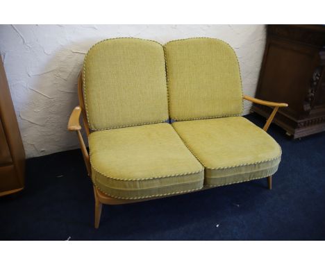 Ercol Blue Label Windsor two seat settee 203 model in Blondewood, exceptional condition. H:30 x W:53 x D:34 inches. See photo