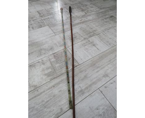 Vintage tribal spear and a glass walking cane, the longest measures 55.5". Not suitable for postage courier or collection onl