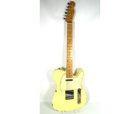 Probable Copy of a 1960's Era Fender Telecaster (Blondy) in fair condition with wear related scuffs to body. Very little wear