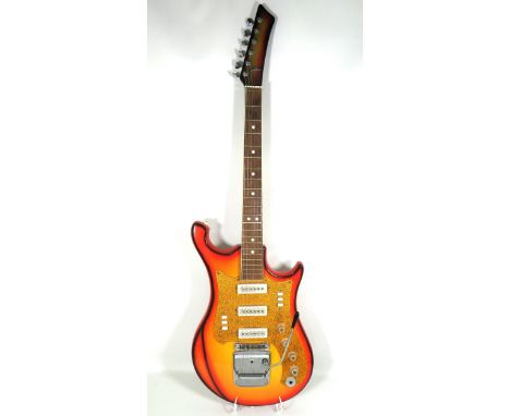 Soviet Vintage URAL 650 Six String Guitar in Orange Burst. Fair condition, minor age related wear evident. Measures approx 41