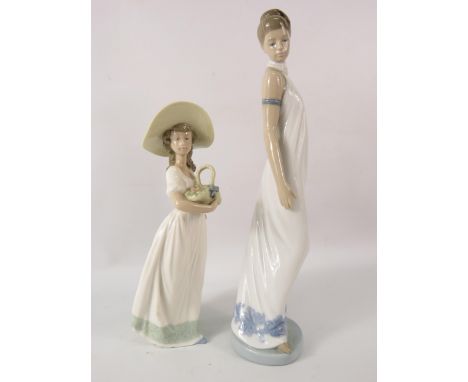 Two Nao figurines one of a elegant lady and one of a girl with a basket, the tallest measures 12".