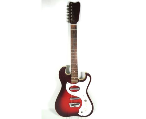 Vintage Silvertone Sunburst 1457 in Red Sparkle Finish and cream textured edge to body. Some Minor evidence of wear and use. 