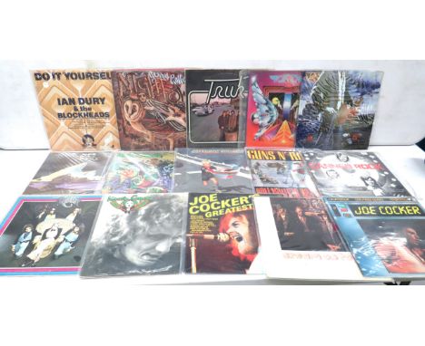 Fifteen Vintage Rock &amp; Pop LP's by Artists such as Gerry Rafferty, Ian Dury, Yes,  Jefferson Starship, Guns &amp; Roses. 
