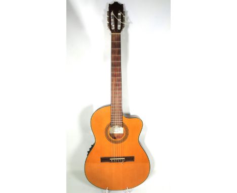 Rare, Vintage Cremona Soviet Made Accoustic/Electric Guitar. In fair condition in Oak Tan, In light worn condition. Sounds go