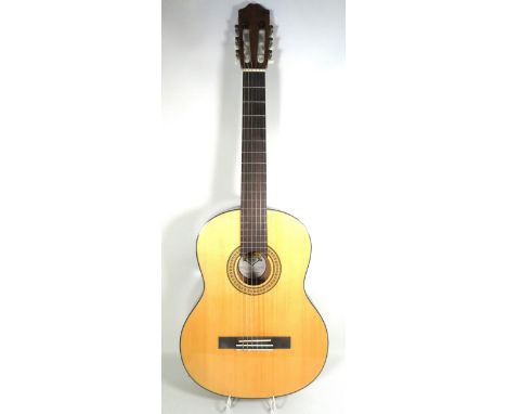 1980's Vintage Santiago Perez, Classical Semi Accoustic Guitar in Natural Wood Finish. Lovely accoustic sound but is much bet