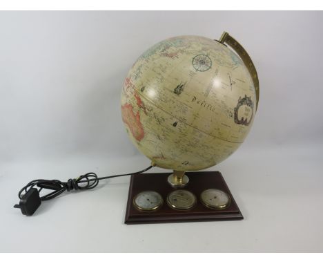 World globe lamp with barometer, thermometer to the base. 16" tall.