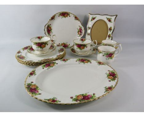 Selection of Royal Albert Old Country Roses, Large tea cups and saucers, dinner plates, picture frame etc. 13 pieces in total