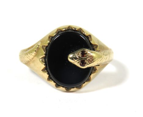 9ct Yellow Gold Ring set with a circular Black Onyx Stone which has a snake entwined on the shank and stone. Snake eyes set w
