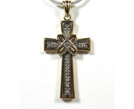 9ct Yellow Gold Celtic Style Crucifix Pendant which is set with multiple Melee Diamonds. Cross measures 35 x 17 mm… Total wei