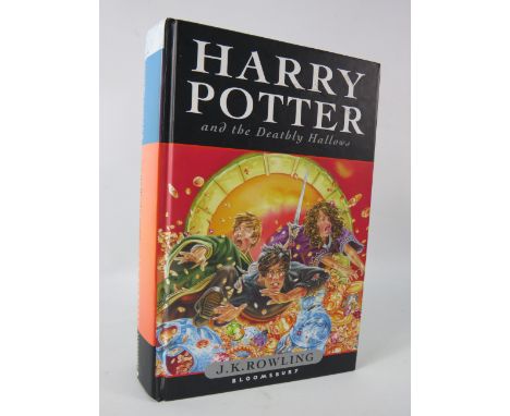 Harry Potter and The Deathly Hallows First Edition hard back book.