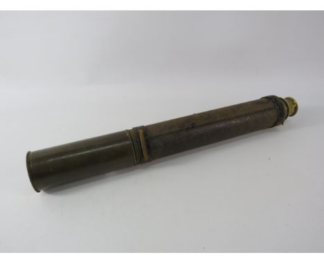 Vintage brass telescope with leather to the body.