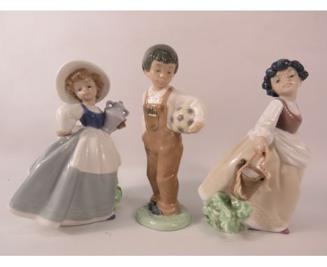 Three Nao figurines of children the tallest stands, 7.5".