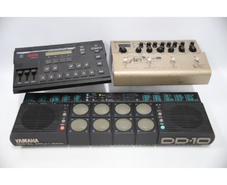 Yamaha DD-10 Digital Drum Bank, Yamaha AG- Stomp Accoustic Pre Amp and a Digitech Vocalist VHM. All have power cords and appe