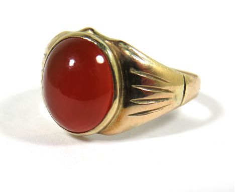 9ct Yellow Gold Signet Ring set with a large Cornelian Cabouchon which measures approx 12 x 10mm.   Finger size 'Q'  5.6g